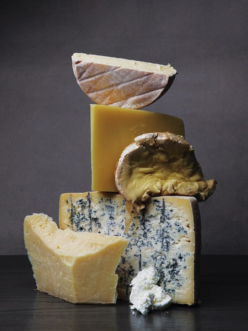A tower of wonderful cheeses. Elsa Young Photography. A tower of wonderful cheeses. Elsa Young Photography.