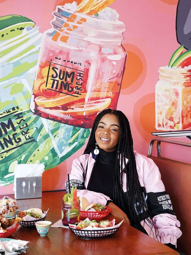 Shekinah, South African music star, enjoying lunch. Portrait by Elsa Young. Shekinah, South African music star, enjoying lunch. Portrait by Elsa Young.