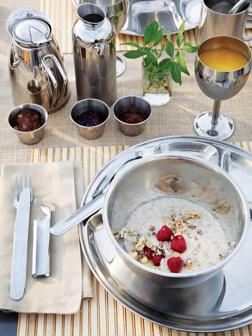 A bowl of oats and a goblet of fresh juice in the African bush. Photo by Elsa Young. A bowl of oats and a goblet of fresh juice in the African bush. Photo by Elsa Young.