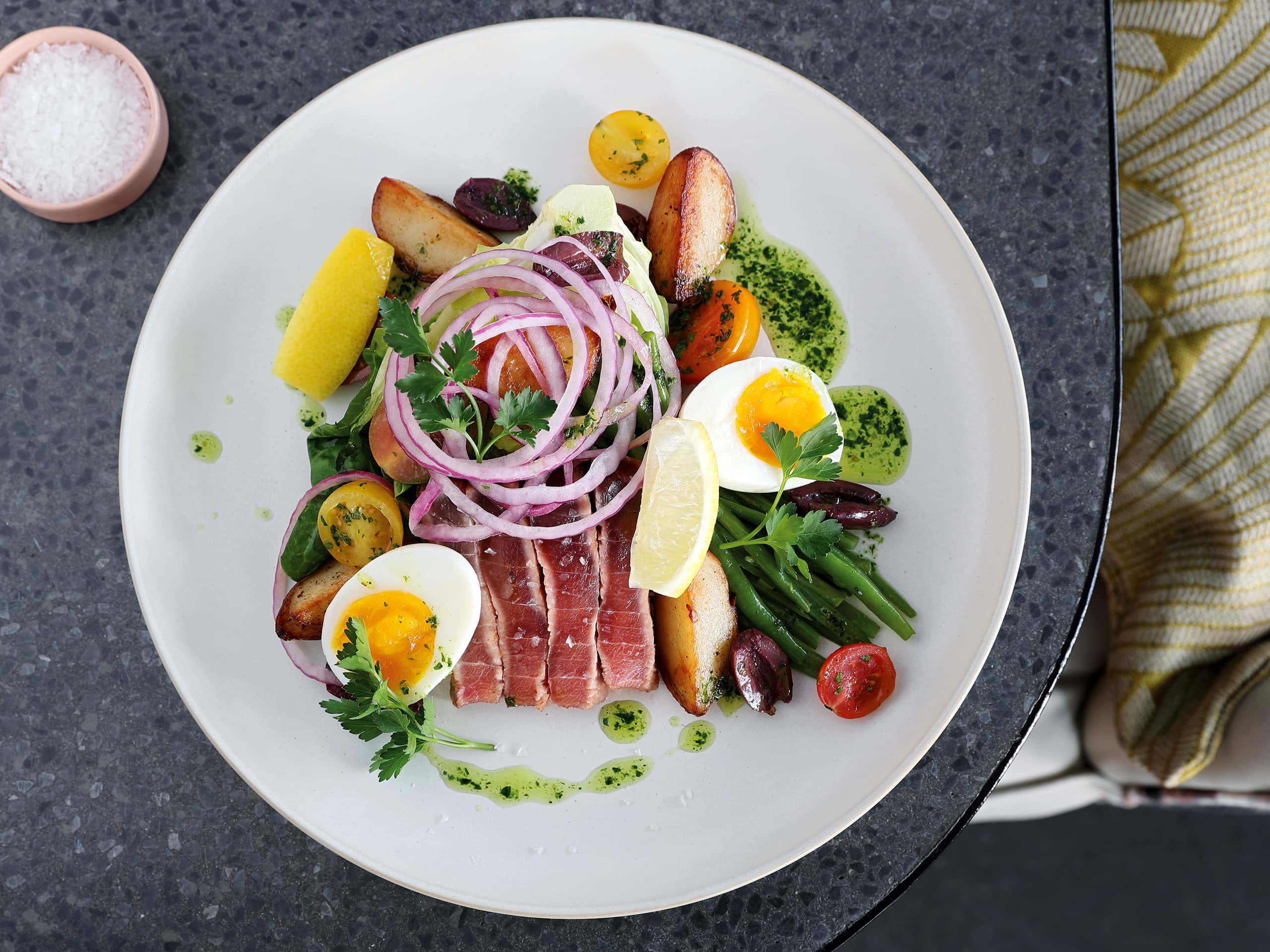 A plate of perfectly cooked meat and vegetables at Saint Restaurant. Elsa Young Photography. A plate of perfectly cooked meat and vegetables at Saint Restaurant. Elsa Young Photography.