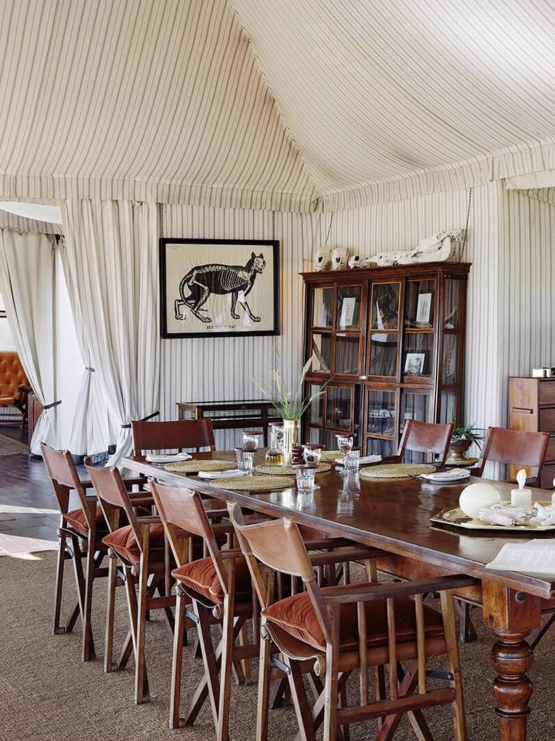 Campaign-style tented dining area at Natural Selection's San Camp, Botswana. Photo by Elsa Young. Campaign-style tented dining area at Natural Selection's San Camp, Botswana. Photo by Elsa Young.