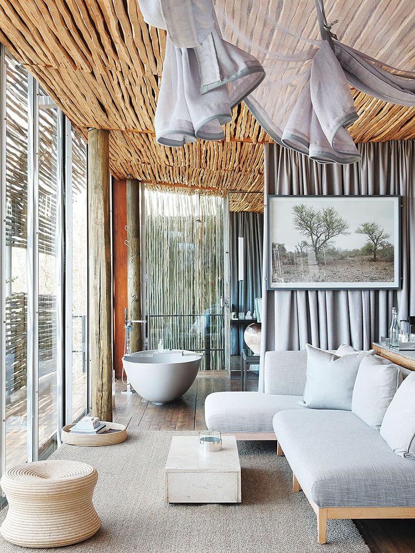 Sophisticated suite with in-room bathtub at Singita Lebombo, Kruger National Park. Sophisticated suite with in-room bathtub at Singita Lebombo, Kruger National Park.