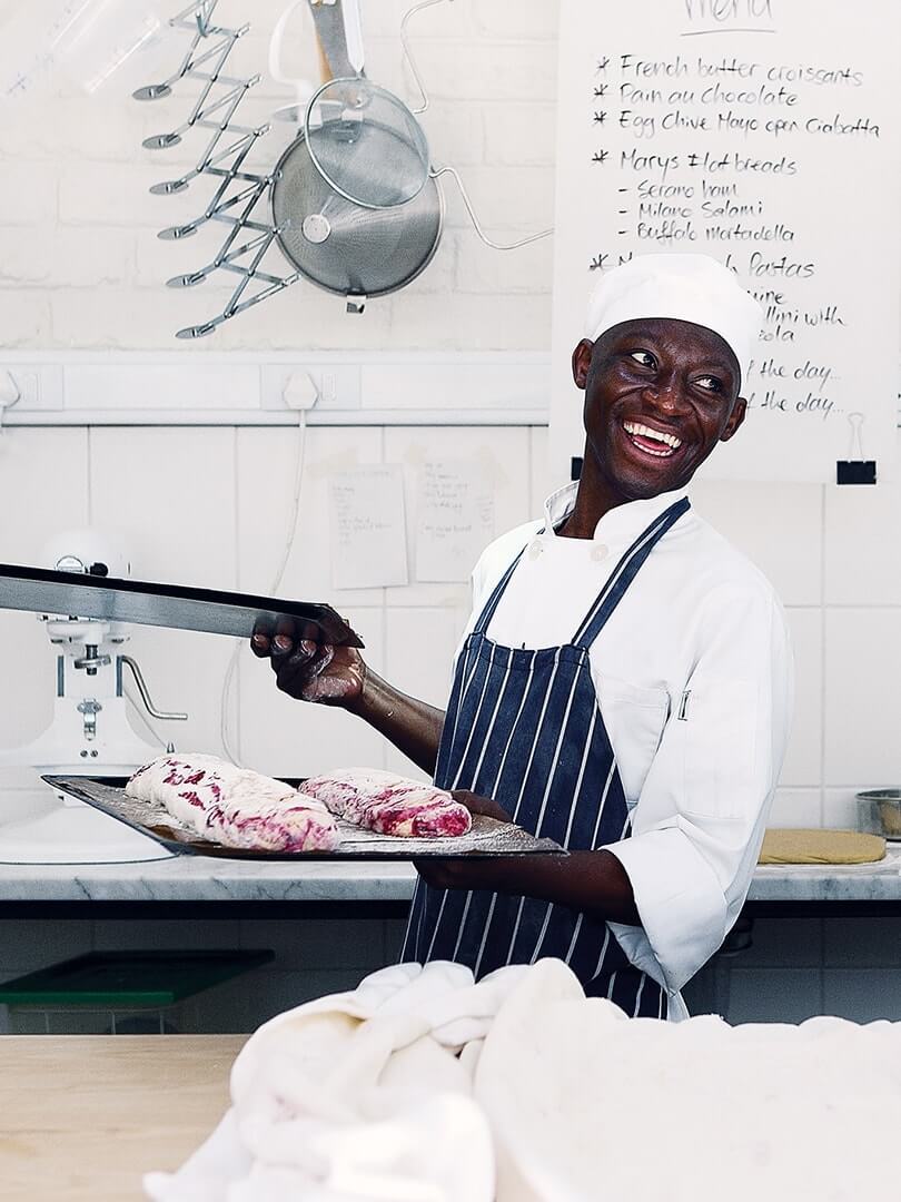 Portrait of a very happy baker. Elsa Young Photography. Portrait of a very happy baker. Elsa Young Photography.