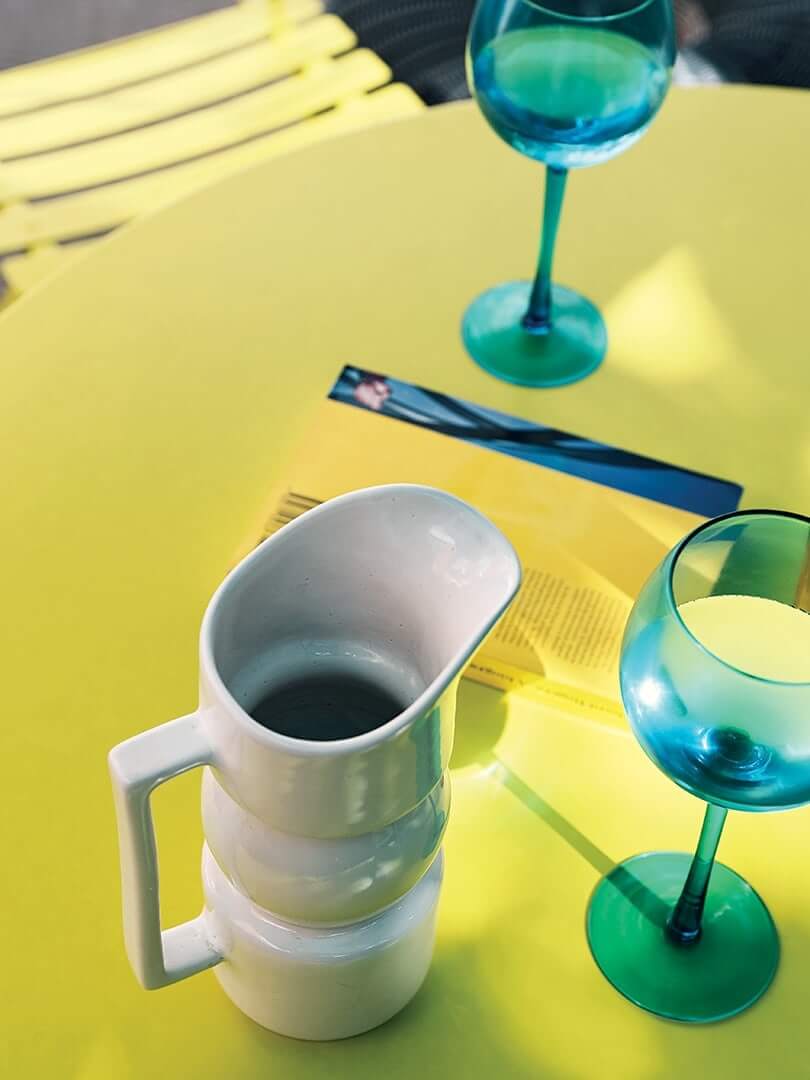 Wine carafe and glasses on a table. Wine carafe and glasses on a table.