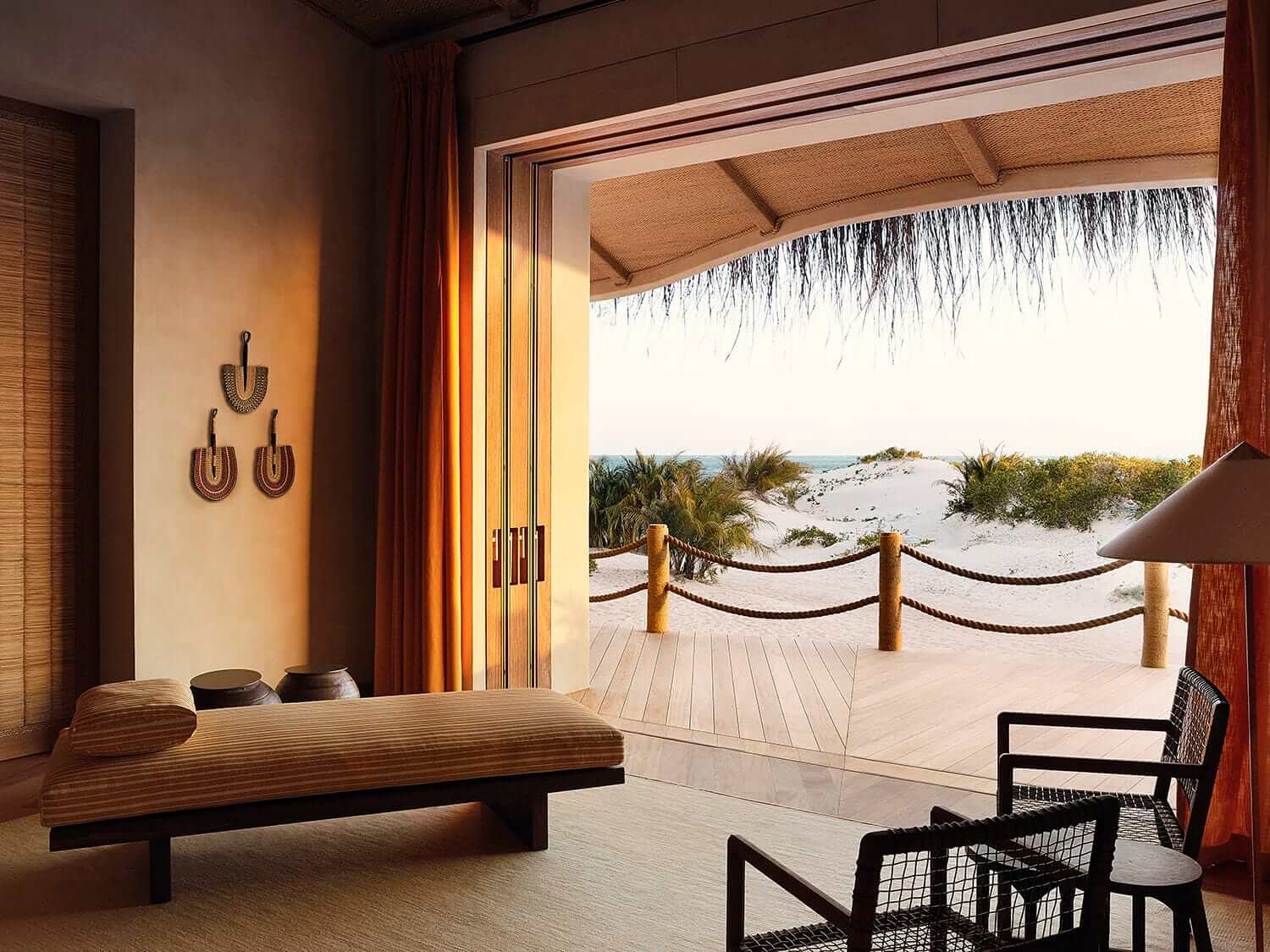Looking out from a luxury suite to the sand dunes and ocean outside at Kisawa Sanctuary, Mozambique. Photo by Elsa Young. Looking out from a luxury suite to the sand dunes and ocean outside at Kisawa Sanctuary, Mozambique. Photo by Elsa Young.