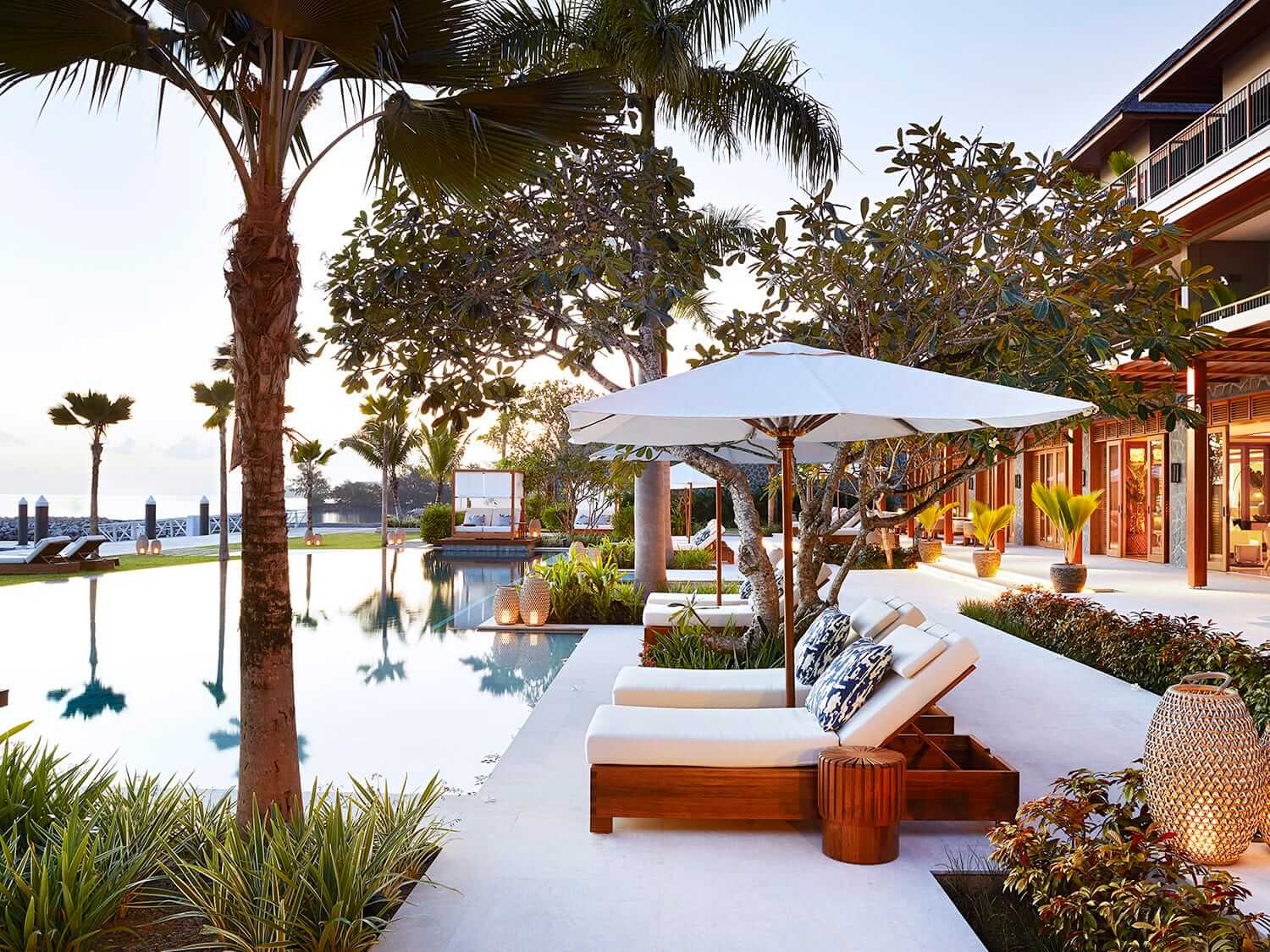 Loungers overlooking a pool and the ocean at The Wharf Hotel, Seychelles. Photo by Elsa Young. Loungers overlooking a pool and the ocean at The Wharf Hotel, Seychelles. Photo by Elsa Young.