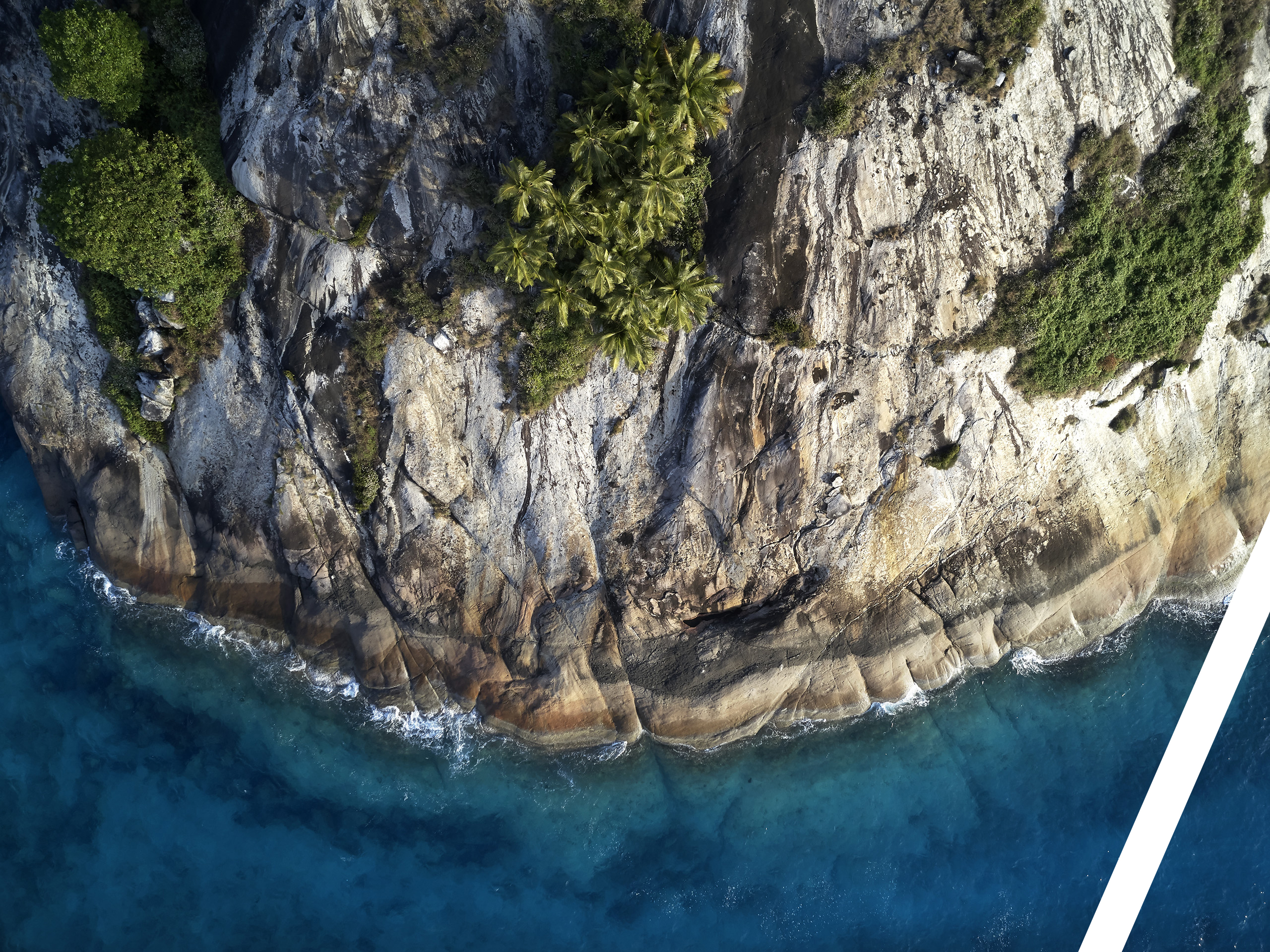 38_elsa_young_travel_photography_north_island_diagonal2 Drone view of North Island's headland, Seychelles. Photo by Elsa Young.